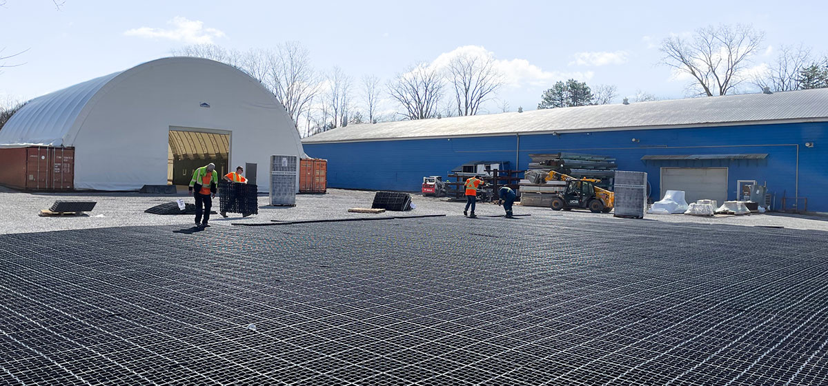 Installing a Ecoraster permeable paving system at Henderson Recreation headquarters in Simcoe, Ontario.