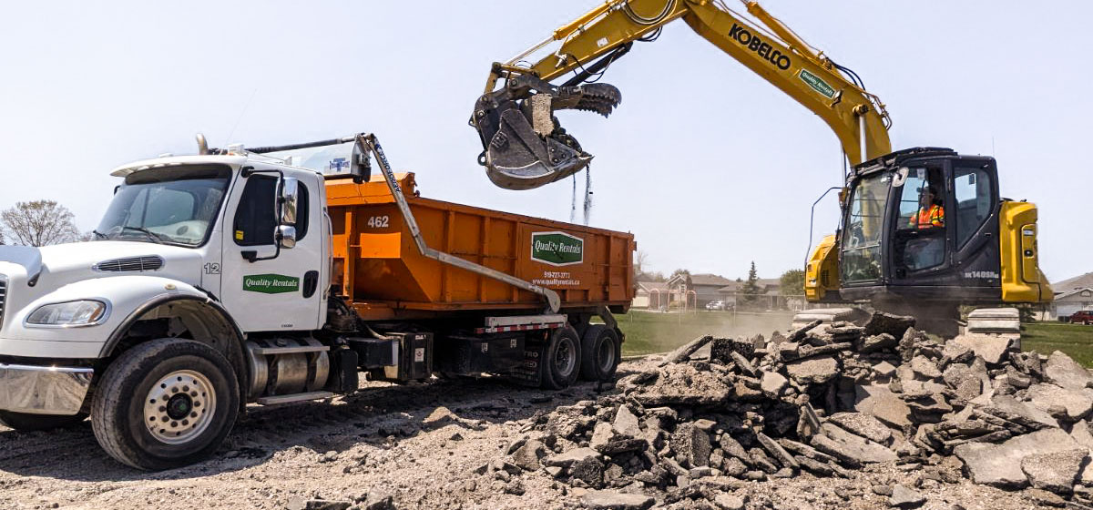 Efficient asphalt removal and site clearing for the sports track renovation at Cardinal Carter Sports Track (Leamington).