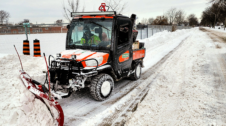 Commercial sidewalk snow removal services for the Greater Essex County District School Board.