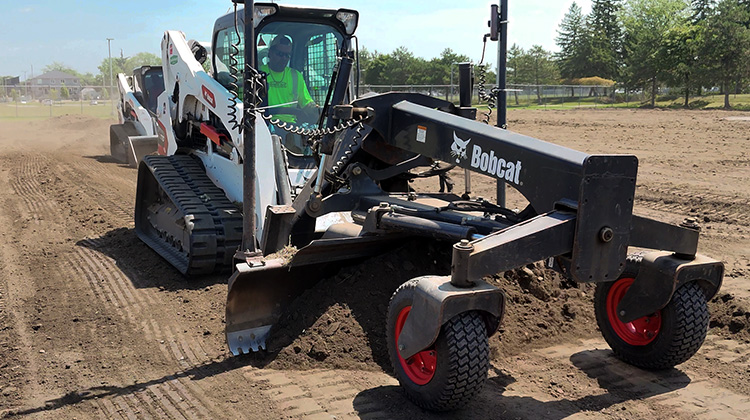Precision laser grading for the new cricket pitch installation at the University of Windsor.